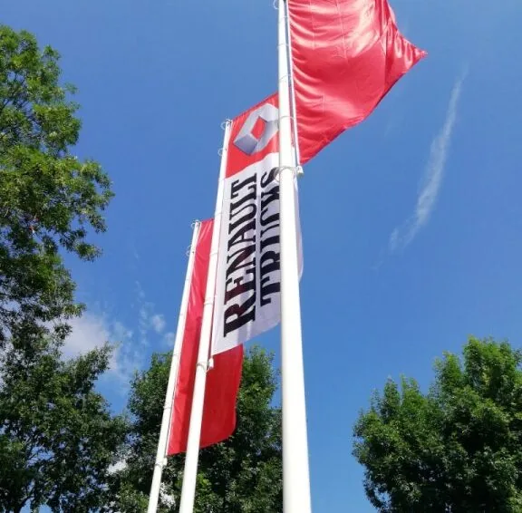 Flagpoles in front of a company headquarters